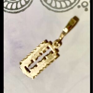 Razor blade pendant